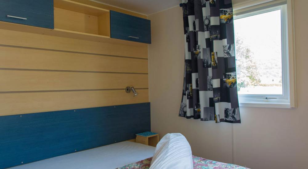 Room 1 bed - Mobil-home supermercure